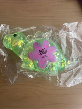 Ulta Beauty Green Glitter Dino Sweet Shimmer Squishy Toy